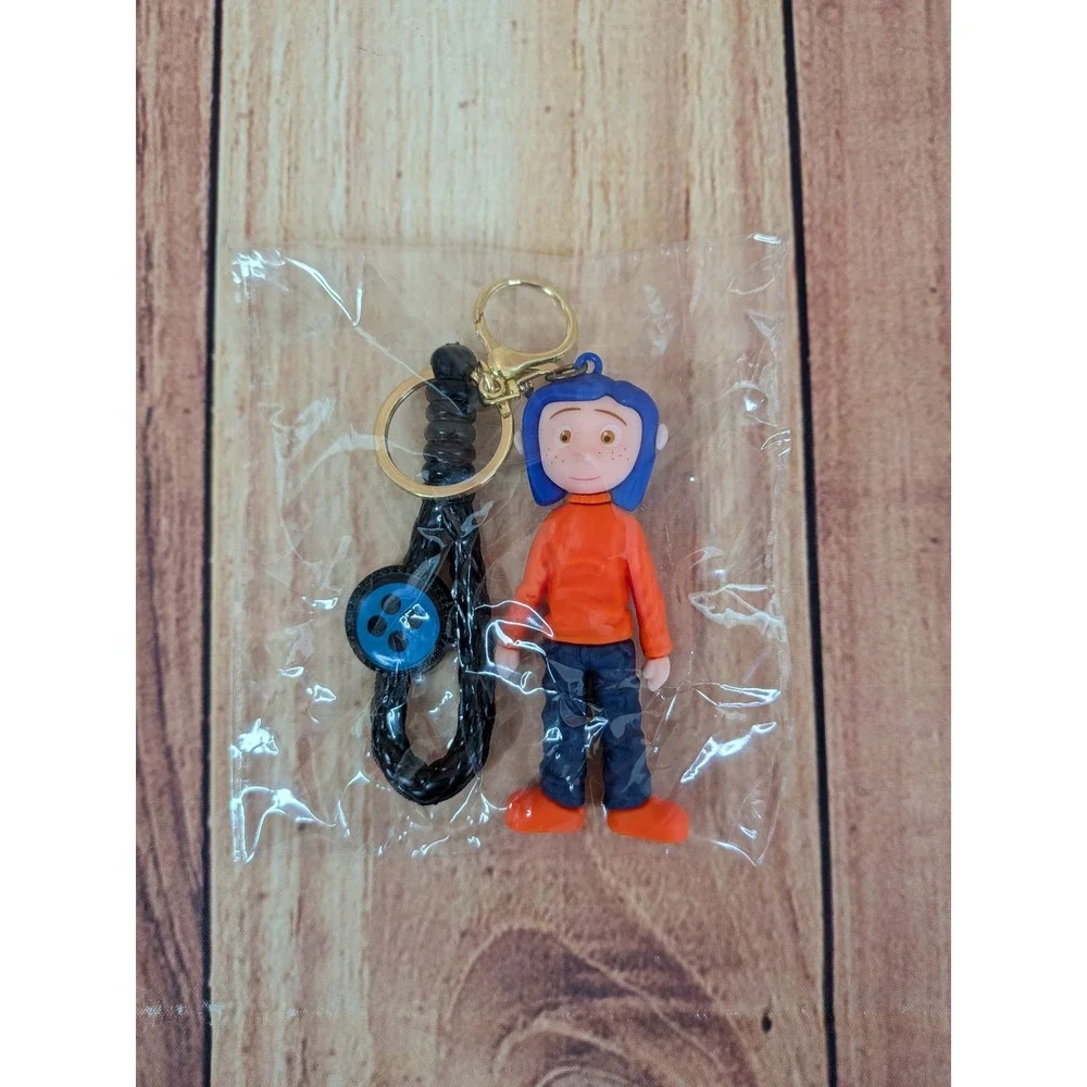 Coraline Mood Doll 3D Keychain with Blue Hair Orange‎ Shirt Button Accessory